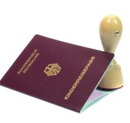 A German passport for a child with large rubber stamp