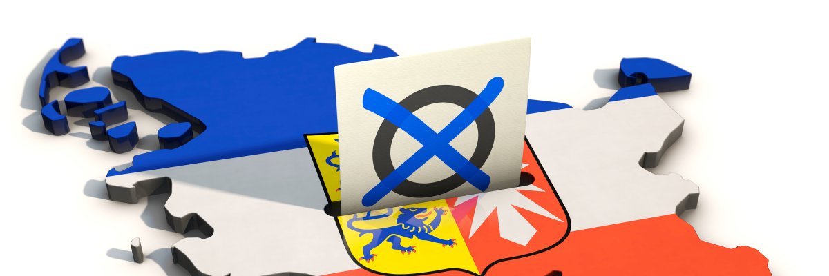 Schleswig-Holstein Landtagswahl 2022 3D-Darstellung der Landkarte von Schleswig-Holstein in Landesfarben mit Landeswappen, in die ein Wahlzettel mit blauem Kreuz gesteckt ist – Symbolbild für Wahlen in Schleswig-Holstein.